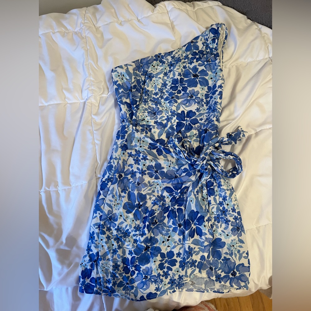 Blue one shoulder dress with a tie on the side